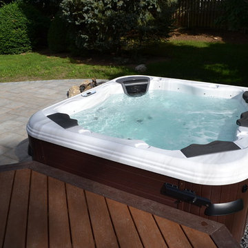 Hot Tub Bullfrog Spas with Trex deck and Cambridge paver patio