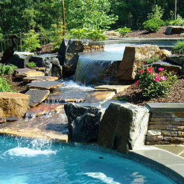 Hunterdon County custom pool with raised spa and waterfall