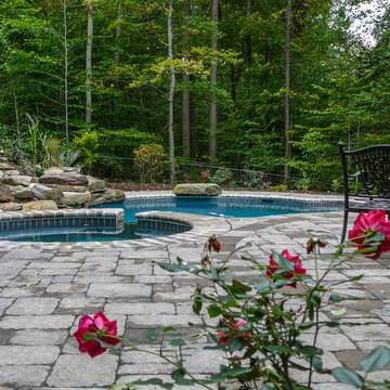 In ground pool with paver patio