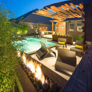 Inspiration for a small asian backyard concrete and rectangular pool remodel in Dallas