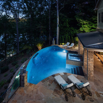 Infinity Edge Pool with Knife Edge Spa and Pool House