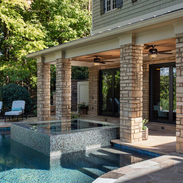Infinity Edge Pool with Knife Edge Spa and Pool House