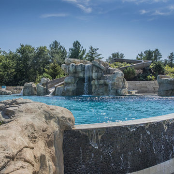 Infinity Edge Pool with Waterfalls and Slide