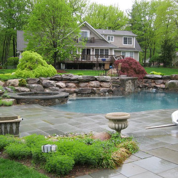 Installation of Pool with waterfalls and Bluestone Pool Decking