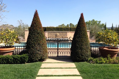 Example of a tuscan concrete paver and rectangular pool design in San Luis Obispo