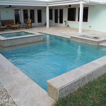 Ivory Tumbled Travertine Pool Deck Tiles, Pavers, and Pool Coping