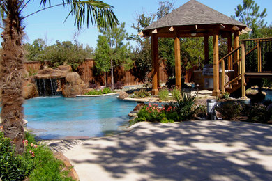 Mountain style pool photo in Dallas