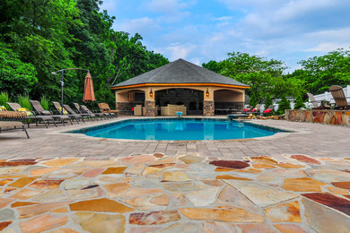 Mountain style backyard stone and rectangular lap pool house photo in Baltimore