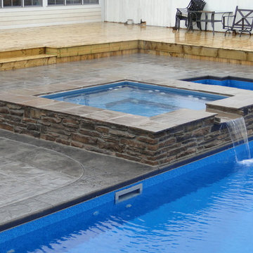 L Shaped Pool with Spillover Spa