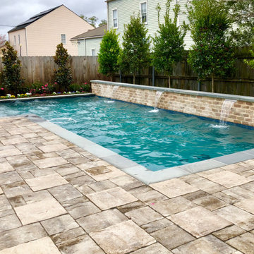 L-Shaped Pool with Stone Deck