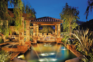 Photo of a mediterranean swimming pool in Orange County.