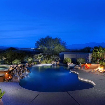 Landscape surrounding swimming pools in the desert southwest