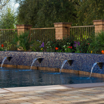 Landscape surrounding swimming pools in the desert southwest