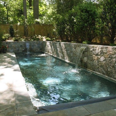 Pool - small contemporary backyard stone and rectangular lap pool idea in DC Metro