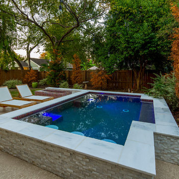 Large Downtown Modern Spa with Glass Tile Fire Feature