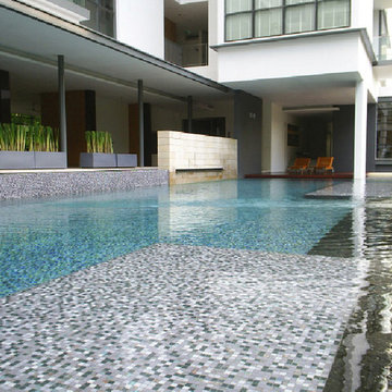 Large modern pool with custom mosac mix