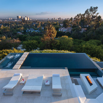 Laurel Way Beverly Hills luxury home modern hillside pool terrace with jetliner