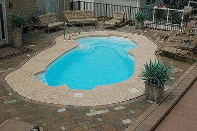 Imagen de piscina exótica extra grande a medida en patio trasero