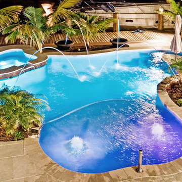 LED Lights on Lagoon/Freeform Pool With Sun Shelf and Bar Area in Fort Lauderdal