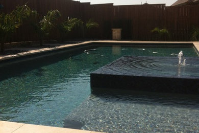 Photo of a contemporary swimming pool in Dallas.