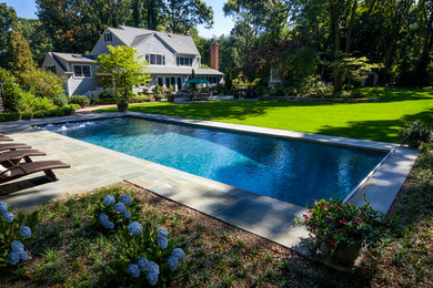 Design ideas for a traditional swimming pool in New York.