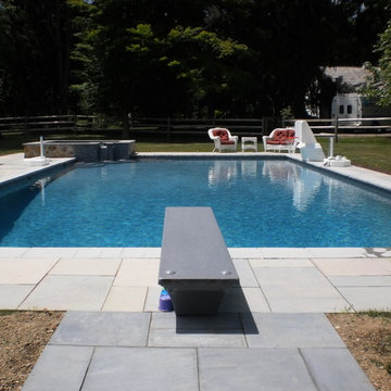 Lower Saucon Township custom rectangular pool with raised spa