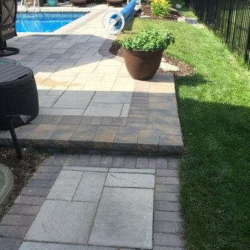 Macomb Township Pool and Patio with Pergola and Fireplace