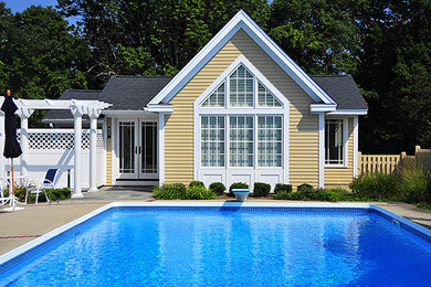 Large backyard concrete and rectangular lap pool house photo in Bridgeport