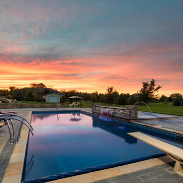 Magnificent Swimming Pool and Sunset Including Water Weirs, Water Falls, and Spe