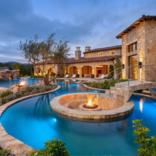 Tuscan custom-shaped water slide photo in San Diego
