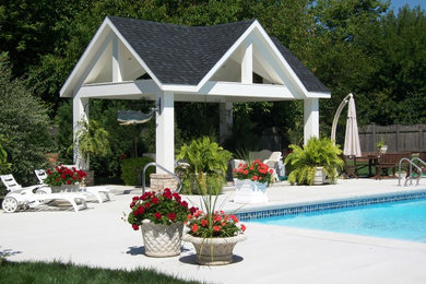 Pool house - mid-sized contemporary backyard concrete and rectangular lap pool house idea in Cincinnati