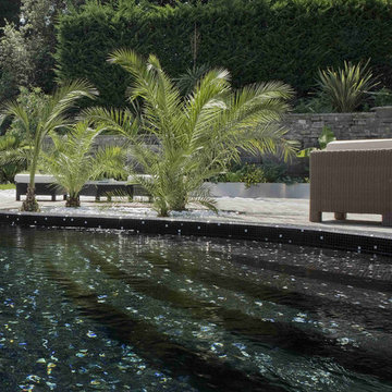 Modern black pool with white gold mosaic