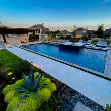 Modern Hillside Pool with Fire and Water Features