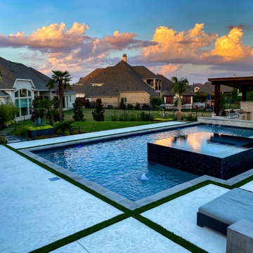 Modern Hillside Pool with Fire and Water Features