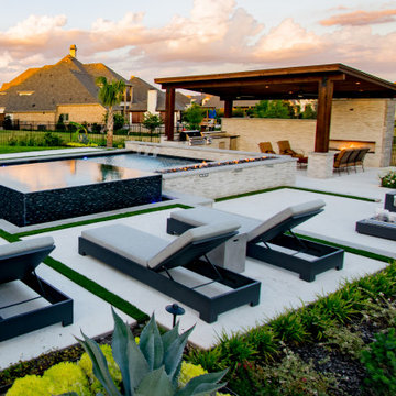 Modern Hillside Pool with Fire and Water Features