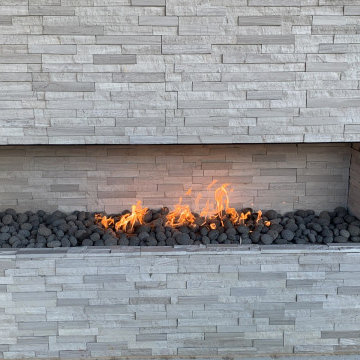 Modern Hillside Pool with Fire and Water Features