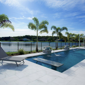 Modern Pool and Deck with Lake View in Saint Cloud, Florida