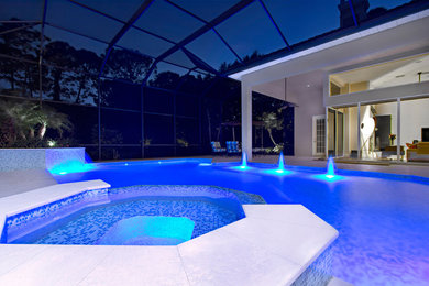 Design ideas for a contemporary swimming pool in Miami.
