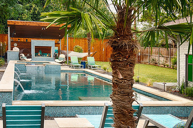Pool - mid-sized contemporary backyard rectangular lap pool idea in Dallas