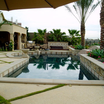 modern tuscan dramatic pool, outdoor living room,