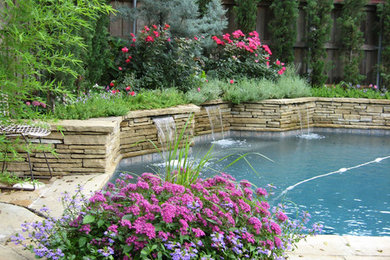 Inspiration for a traditional swimming pool in Dallas.
