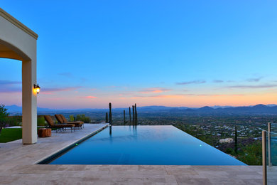 Mountainside Infinity Pool with Multicolored Lighting