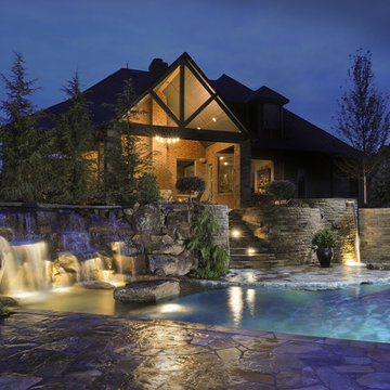 Multi-Level Patios, Waterfalls & Pool Utilizing The Native Oklahoma Terrain