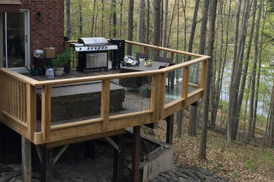 This is an example of a classic hot tub in Toronto with decking.