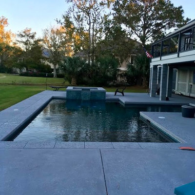 Small transitional backyard concrete paver and l-shaped lap hot tub photo in Atlanta