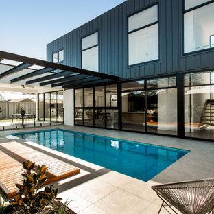 Contemporary side yard rectangular pool in Adelaide.