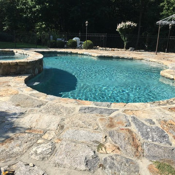 Natural stone patio and pool