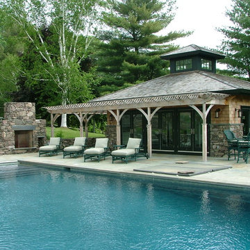 New pool house with pergola and fireplace