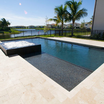 New Pool with Sunshelf and Pebble Tec Finish in Delray Beach Florida