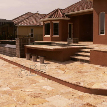 New Pool with Travertine deck & coping and double retaining wall